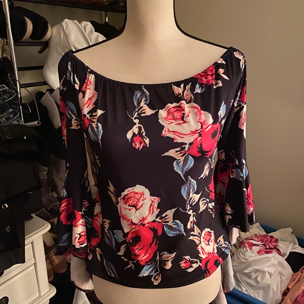 Fancy sculpted flowery off the shoulder top